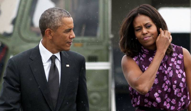 Michelle og Barack Obama. Obamas datter var praktikant for Weinstein.