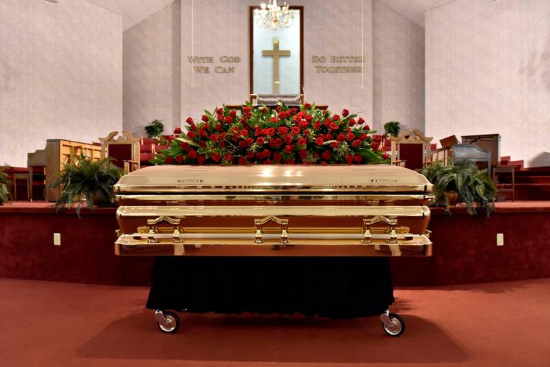 The casket of George Floyd is set inside the church for a memorial service Saturday, June 6, 2020, in Raeford, N.C. Floyd died after being restrained by Minneapolis police officers on May 25. (Ed Clemente/The Fayetteville Observer via AP, Pool)