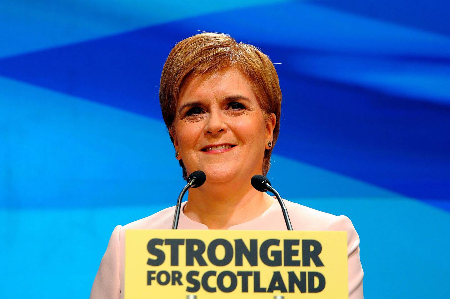 Scotland's First Minister Nicola Sturgeon delivers her keynote speech on the second day of the Scottish National Party (SNP) annual conference in Aberdeen, Scotland on June 9, 2018.  / AFP PHOTO / Andy Buchanan