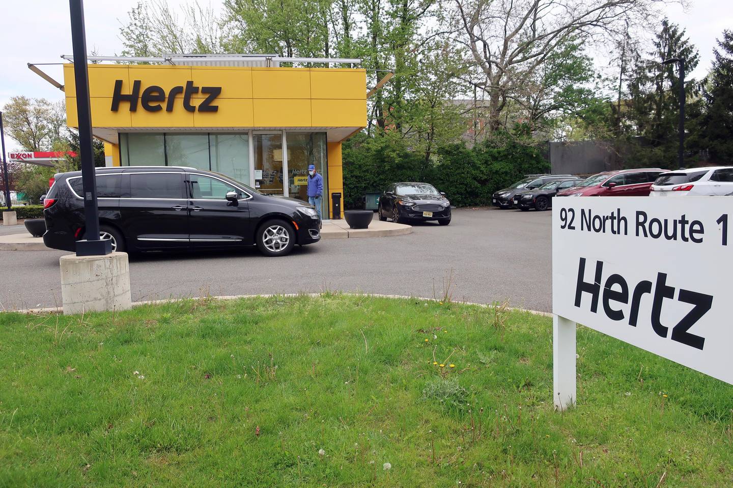 FILE - In this May 6, 2020, file photo, a Hertz car rental is closed during the coronavirus pandemic in Paramus, N.J. Hertz filed for bankruptcy protection Friday, May 22, 2020, unable to withstand the pandemic that has crippled global travel and with it, the heavily indebted 102-year-old car rental company's business. (AP Photo/Ted Shaffrey, File)