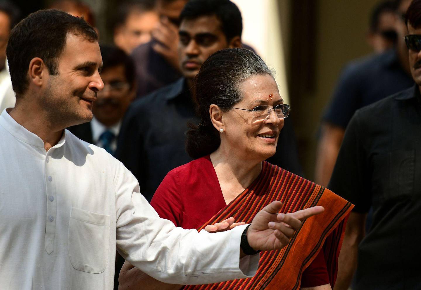 Indian Congress party senior leader Sonia Gandhi (R), along with her son, Indian National Congress party president Rahul Gandhi (L), leaves after filing her nomination papers for the forthcoming general election at a district court in Rae Bareilly on April 11, 2019. - India's gargantuan election, the biggest in history, kicked off on April 11 with Prime Minister Narendra Modi seeking a second term from the South Asian behemoth's 900 million voters. (Photo by SANJAY KANOJIA / AFP)