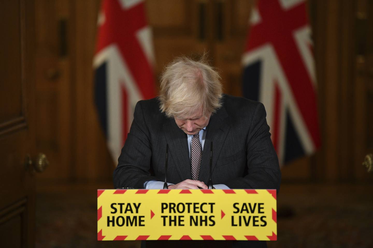 Boris Johnson under en koronapressekonferanse i januar 2021. Han har fått kritikk for koronahåndteringen.