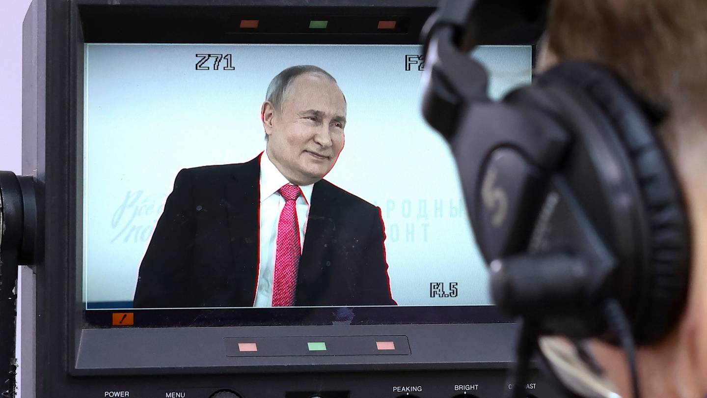 Russian President Vladimir Putin is seen on the a TV camera screen as he speaks at a forum titled "All for a Victory!" held by the All-Russia People's Front in Tula, Russia, Friday, Feb. 2, 2024. (Artyom Geodakyan, Sputnik, Kremlin Pool Photo via AP)