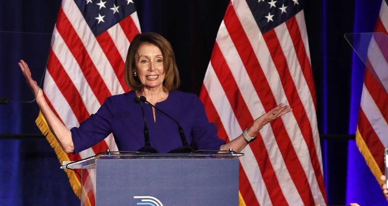 House Minority Leader Nancy Pelosi of Calif., smiles as she is cheered by a crowd of Democratic supporters during an election night returns event at the Hyatt Regency Hotel, on Tuesday, Nov. 6, 2018, in Washington. (AP Photo/Jacquelyn Martin)