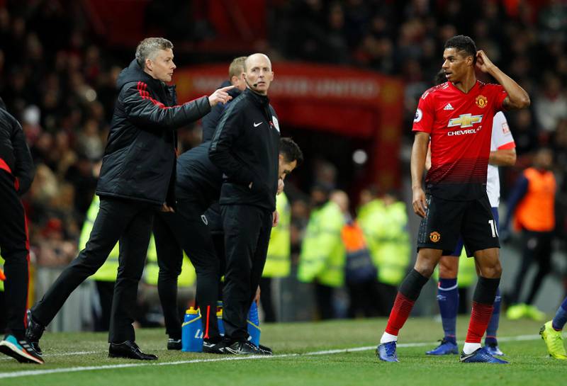 Soccer Football - Premier League - Manchester United v AFC Bournemouth - Old Trafford, Manchester, Britain - December 30, 2018  Manchester United interim manager Ole Gunnar Solskjaer gives instructions to Marcus Rashford           REUTERS/Phil Noble  EDITORIAL USE ONLY. No use with unauthorized audio, video, data, fixture lists, club/league logos or "live" services. Online in-match use limited to 75 images, no video emulation. No use in betting, games or single club/league/player publications.  Please contact your account representative for further details.