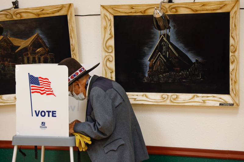 A voter fills out his ballot at the Owyhee County Museum on Election Day, in Murphy, Idaho, on Tuesday, Nov. 3, 2020. (AP Photo/Otto Kitsinger)
