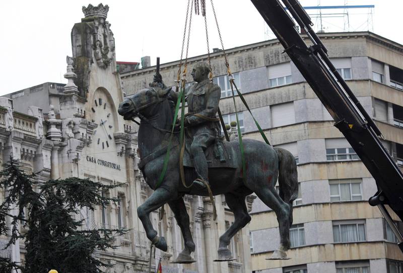 One of Spain's last statues of the late Gen. Francisco Franco is removed from a park in the northern city of Santander Thursday Dec. 18, 2008. With the removal of this Franco statue, now only one remains in public view, in Melilla, a Spanish city on the coast of North Africa. But officials there have said they will take it down as well, although there is no timetable. (AP Photo/Juan Manuel Serrano)