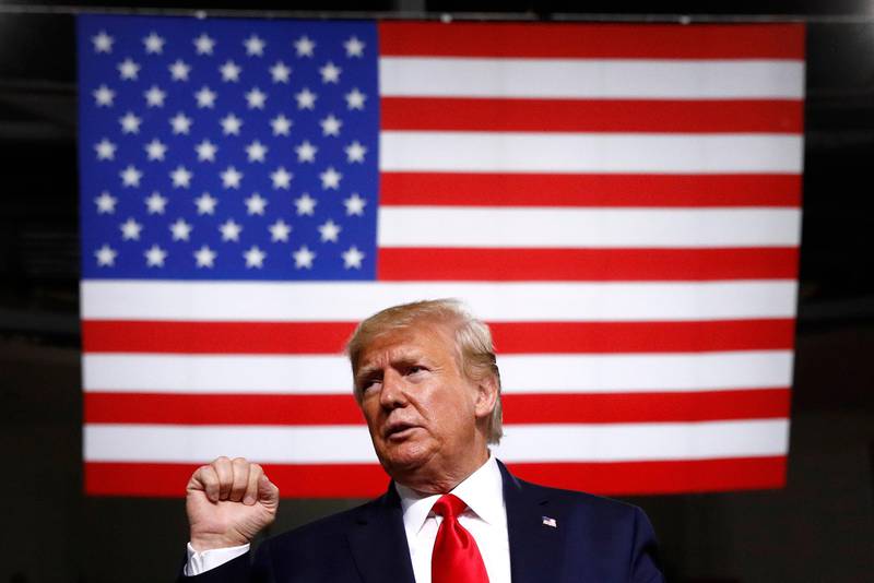 In this Aug. 15, 2019, photo, President Donald Trump acknowledges the crowd after speaking at a campaign rally in Manchester, N.H. The Trump administration is aggressively pursuing economic sanctions as a primary foreign policy tool to an extent unseen in decades, or perhaps ever. Many are questioning the results even as officials insist the penalties are achieving their aims(AP Photo/Patrick Semansky)