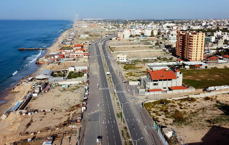 An empty street is seen during a lockdown amid the outbreak of the coronavirus disease (COVID-19), in the northern Gaza Strip December 11, 2020. Picture taken with a drone. REUTERS/Mohammed Salem
