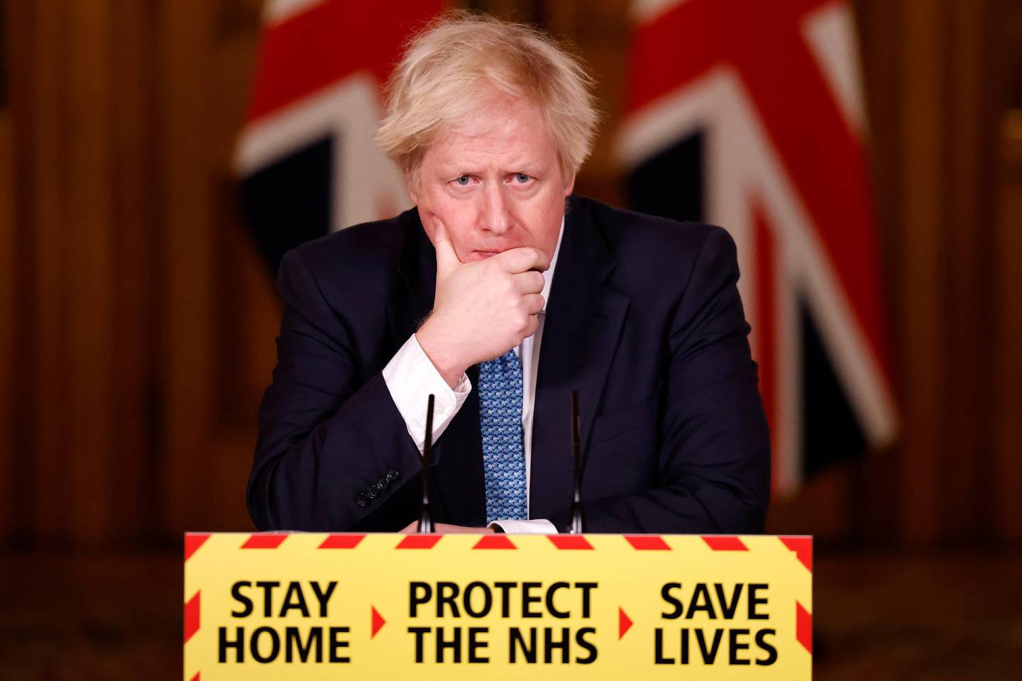 Britain's Prime Minister Boris Johnson reacts during a virtual news conference on the COVID-19 pandemic, at 10 Downing Street in London, Britain January 7, 2021. Tolga Akmen/Pool via REUTERS