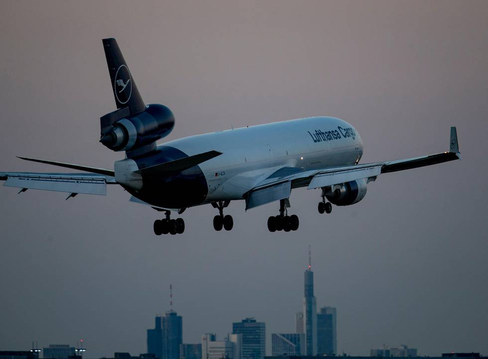 A Lufthansa MD 11 aircraft approaches the airport in Frankfurt, Germany, Tuesday, June 23, 2020. Lufthansa will have its annual shareholders meeting on Thursday. (AP Photo/Michael Probst)