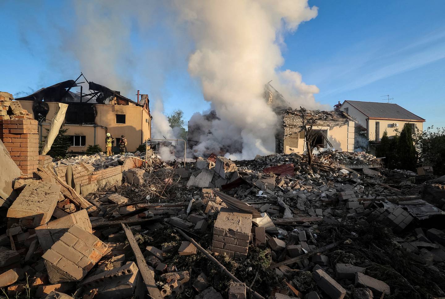 Firefighters work at a site of a Russian missile strike, amid Russia's attack on Ukraine, in Kharkiv, Ukraine May 10, 2024. REUTERS/Vyacheslav Madiyevskyy