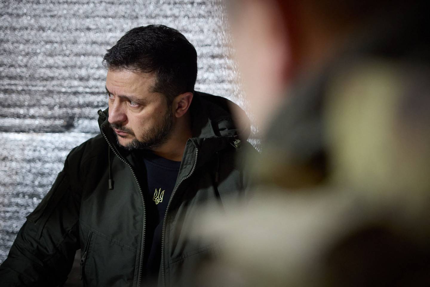 This handout photograph taken and released by Ukrainian Presidential Press Service on December 29, 2023, shows Ukrainian President Volodymyr Zelensky during a visit of the advanced checkpoint of the 110th Separate Mechanized Brigade named after late Ukrainian General-Corporal Marko Bezruchko in the town of Avdiivka, Donetsk region, amid the Russian invasion of Ukraine. (Photo by Handout / UKRAINIAN PRESIDENTIAL PRESS SERVICE / AFP) / RESTRICTED TO EDITORIAL USE - MANDATORY CREDIT "AFP PHOTO / UKRAINIAN PRESIDENTIAL PRESS SERVICE " - NO MARKETING NO ADVERTISING CAMPAIGNS - DISTRIBUTED AS A SERVICE TO CLIENTS