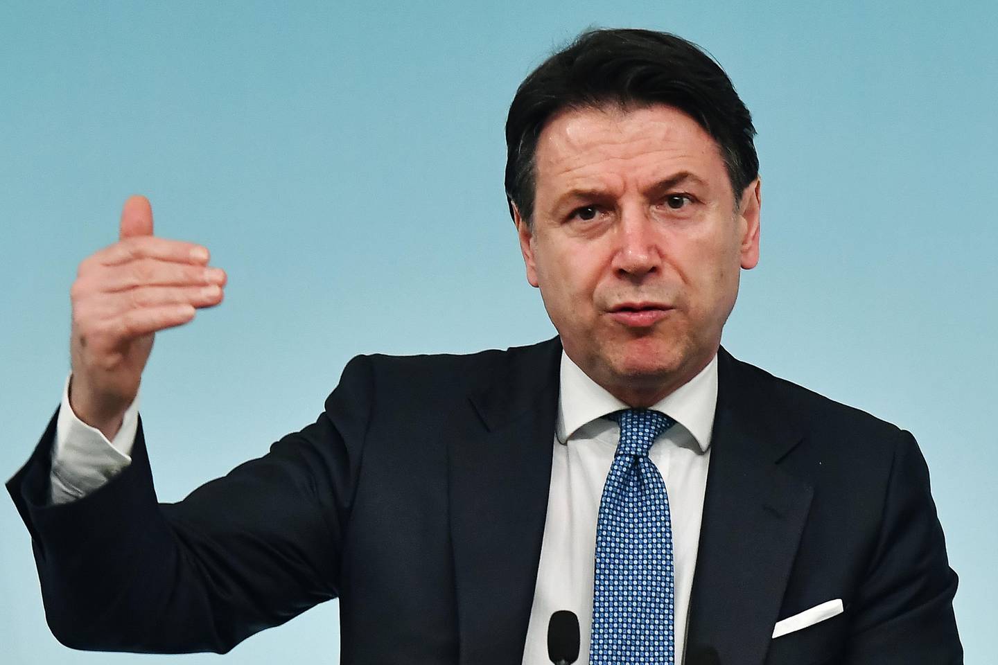 In this photo taken on March 04, 2020 Italy's Prime Minister Giuseppe Conte speaks during a press conference held at Rome's Chigi Palace, following a Ministers' cabinet meeting dedicated to the corinavirus crisis. - Lockdown measures taken in Italy over the coronavirus pandemic will be extended beyond their original deadlines, Prime Minister Giuseppe Conte said on March 19, 2020. (Photo by Tiziana FABI / AFP)