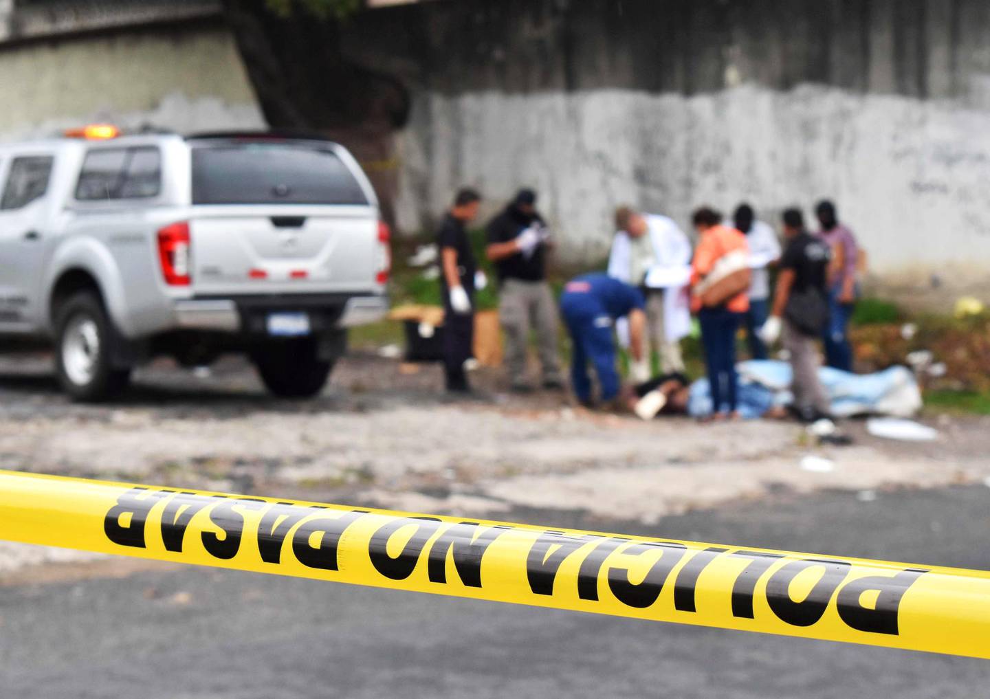 Drap: Politi på et åsted etter et drap 29. mai i år. foto: Oscar Rivera/AFP/ntb scanpix