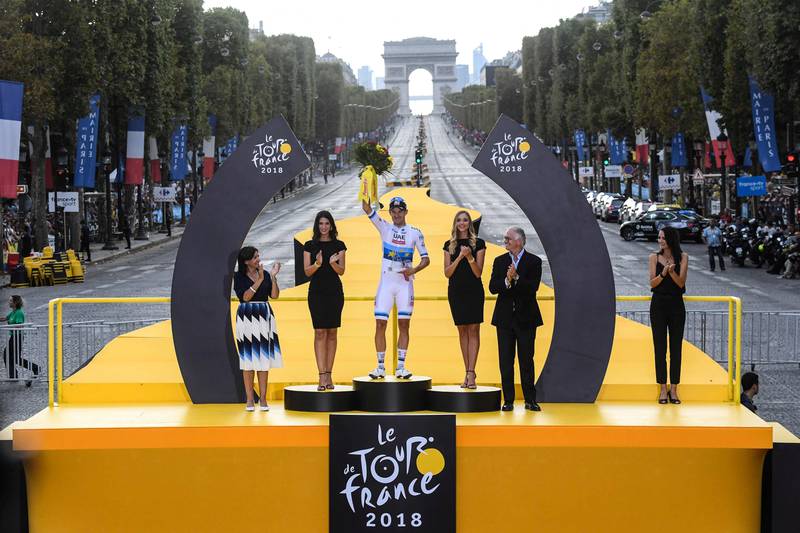 CORRECTION - Norway's Alexander Kristoff (C) poses flanked by Paris Mayor Anne Hidalgo (L) as he celebrates on the podium after winning the 21st and last stage of the 105th edition of the Tour de France cycling race between Houilles and Paris Champs-Elysees, on July 29, 2018. / AFP PHOTO / POOL / STEPHANE MANTEY / The erroneous BYLINE appearing in the metadata of this photo   has been modified in AFP systems in the following manner: [BYLINE: STEPHANE MANTEY ] instead of [BYLINE: JEFF PACHOUD]. Please immediately remove the erroneous mention from all your online services and delete it  from your servers. If you have been authorized by AFP to distribute it   to third parties, please ensure that the same actions are carried out by them. Failure to promptly comply with these instructions will entail liability on your part for any continued or post notification usage. Therefore we thank you very much for all your attention and prompt action. We are sorry for the inconvenience this notification may cause and remain at your disposal for any further information you may require.