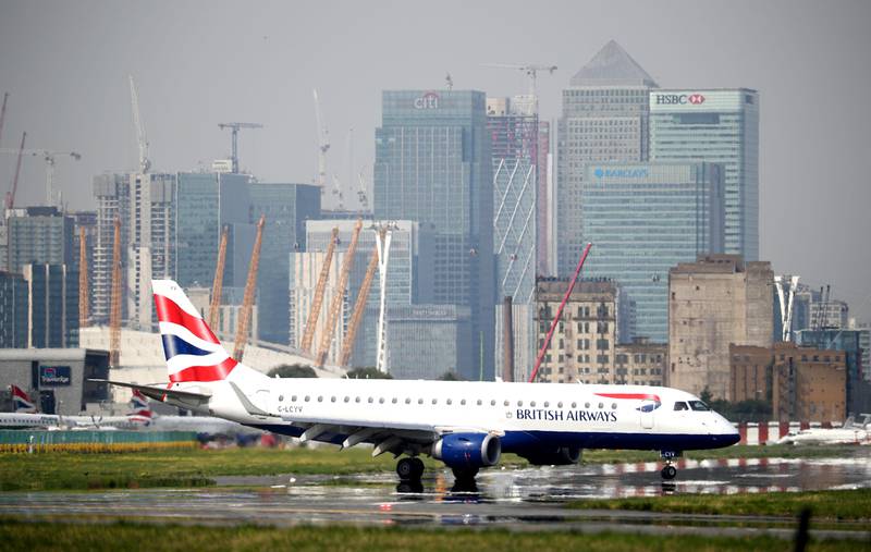 FILE PHOTO: A British Airways airplane taxis at City Airport in London, Britain, September 3, 2018. REUTERS/Hannah McKay/File Photo                    GLOBAL BUSINESS WEEK AHEAD