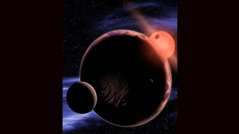Illustrasjon av en eksoplanet (med to måner) i beboelig avstand fra den røde dvergen Proxima Centauri, som ligger 4,24 lysår unna vår egen sol. FOTO: David Aguilar/Harvard-Smithsonian Center for Astrophysics