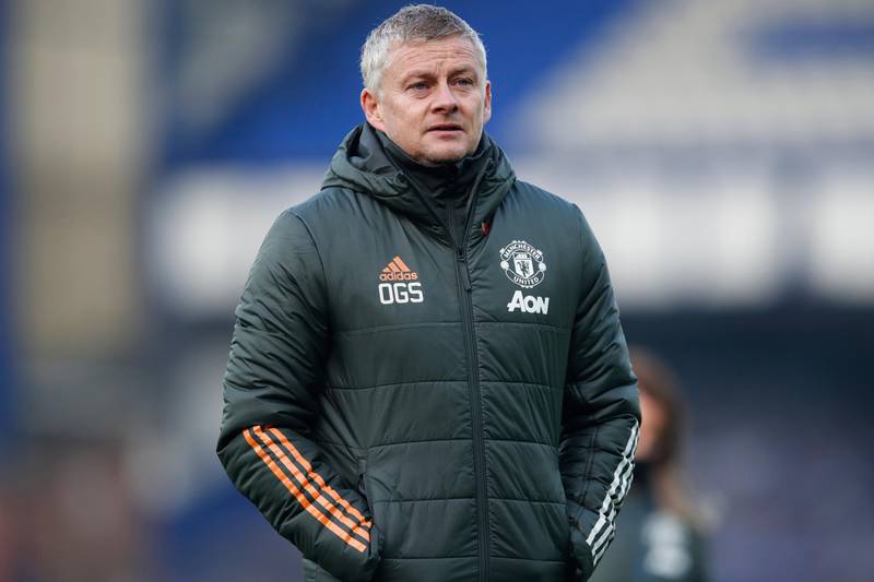 Manchester United's manager Ole Gunnar Solskjaer walks to the bench during the English Premier League soccer match between Everton and Manchester United at the Goodison Park stadium in Liverpool, England, Saturday, Nov. 7, 2020. (Clive Brunskill/Pool via AP)