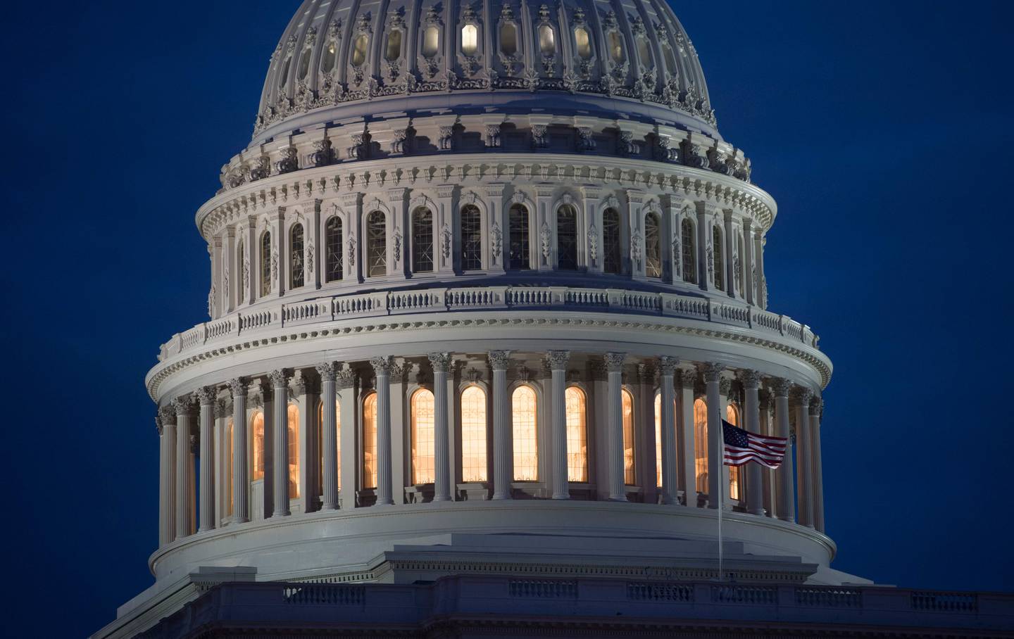 (FILES) In this file photo taken on February 06, 2018 The US Capitol Building is seen at dusk in Washington, DC. - Armenia rejoiced but Turkey was furious on October 30, 2019 after the US House of Representatives passed a historic resolution recognizing mass killings of Armenians a century ago as genocide. With tensions already high over Turkey's assault on Kurdish-controlled areas of northern Syria, US lawmakers voted 405 to 11 on Tuesday in support of the measure to "commemorate the Armenian Genocide through official recognition and remembrance."The move was a first for the US Congress, where similar measures with such direct language have been introduced for decades but never passed. (Photo by SAUL LOEB / AFP)