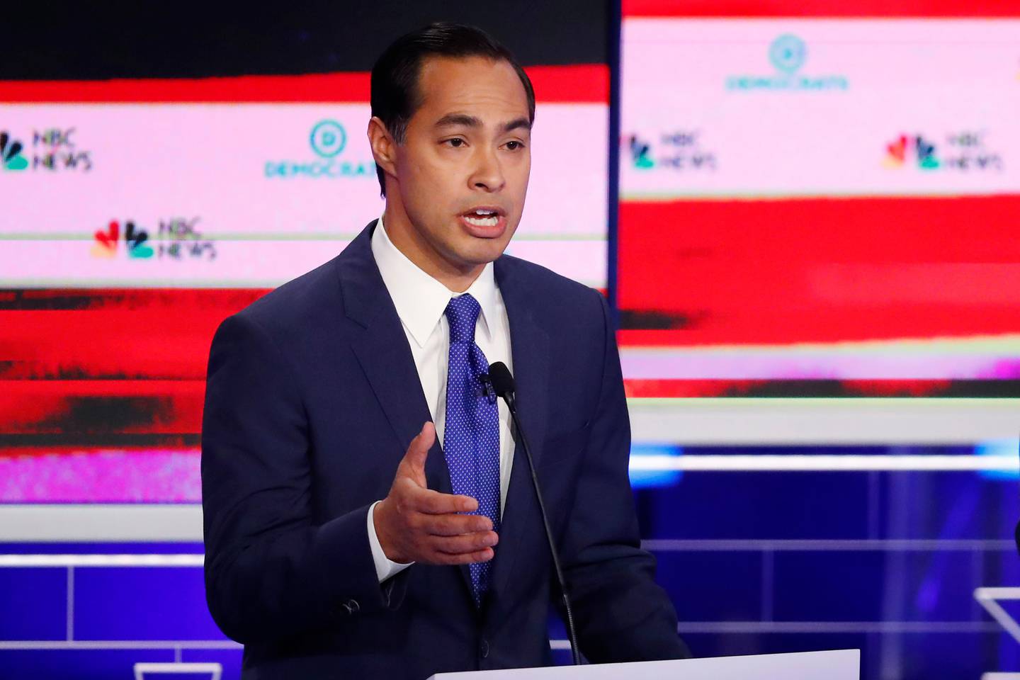 Democratic presidential candidate former Housing and Urban Development Secretary Julian Castro gestures during a Democratic primary debate hosted by NBC News at the Adrienne Arsht Center for the Performing Arts, Wednesday, June 26, 2019, in Miami. (AP Photo/Wilfredo Lee)