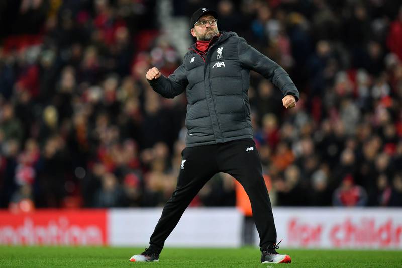 Liverpool's German manager Jurgen Klopp celebrates on the pitch after the English FA Cup third round football match between Liverpool and Everton at Anfield in Liverpool, north west England on January 5, 2020. - Liverpool won the game 1-0. (Photo by Paul ELLIS / AFP) / RESTRICTED TO EDITORIAL USE. No use with unauthorized audio, video, data, fixture lists, club/league logos or 'live' services. Online in-match use limited to 120 images. An additional 40 images may be used in extra time. No video emulation. Social media in-match use limited to 120 images. An additional 40 images may be used in extra time. No use in betting publications, games or single club/league/player publications. / 
