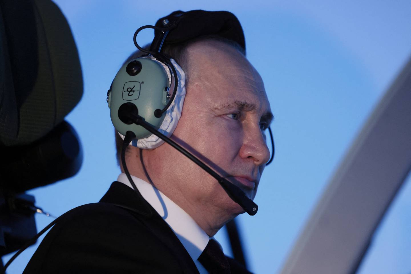 Russian President Vladimir Putin sits in a cockpit of a flight simulator at the Higher Military Aviation School of Pilots named after Hero of the Soviet Union A.K. Serov in Krasnodar, Russia March 7, 2024. Sputnik/Mikhail Metzel/Pool via REUTERS ATTENTION EDITORS - THIS IMAGE WAS PROVIDED BY A THIRD PARTY.