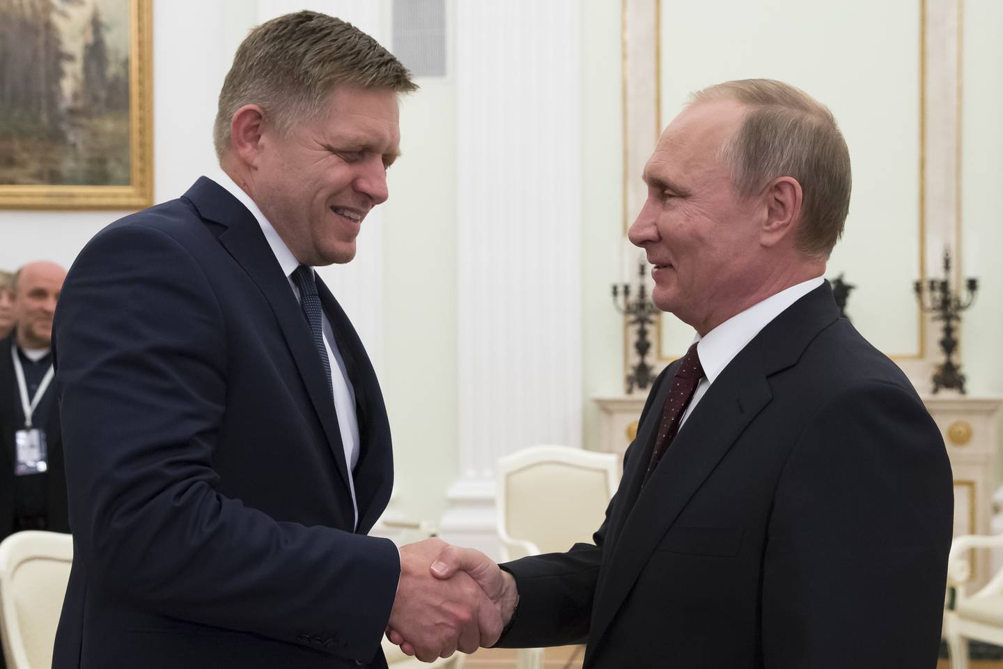 CORRECTING ID TO SLOVAK PRIME MINISTER ROBERT FICO - Russian President Vladimir Putin, right, shakes hands with Slovak Prime Minister Robert Fico during their meeting in the Kremlin in Moscow, Russia, Thursday, Aug. 25, 2016. (AP Photo/Alexander Zemlianichenko, pool)