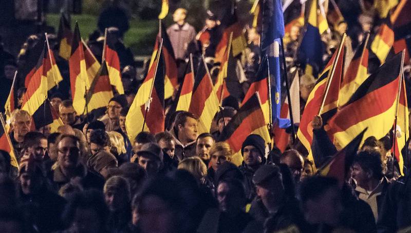 Nasjonalisme: EU-skeptiske partier styrker seg over hele EU. I Tyskland er det fremmedfiendtlige partiet Alternativ for Tyskland nå landets tredje største, ifølge meningsmålingene. FOTO: NTB SCANPIX