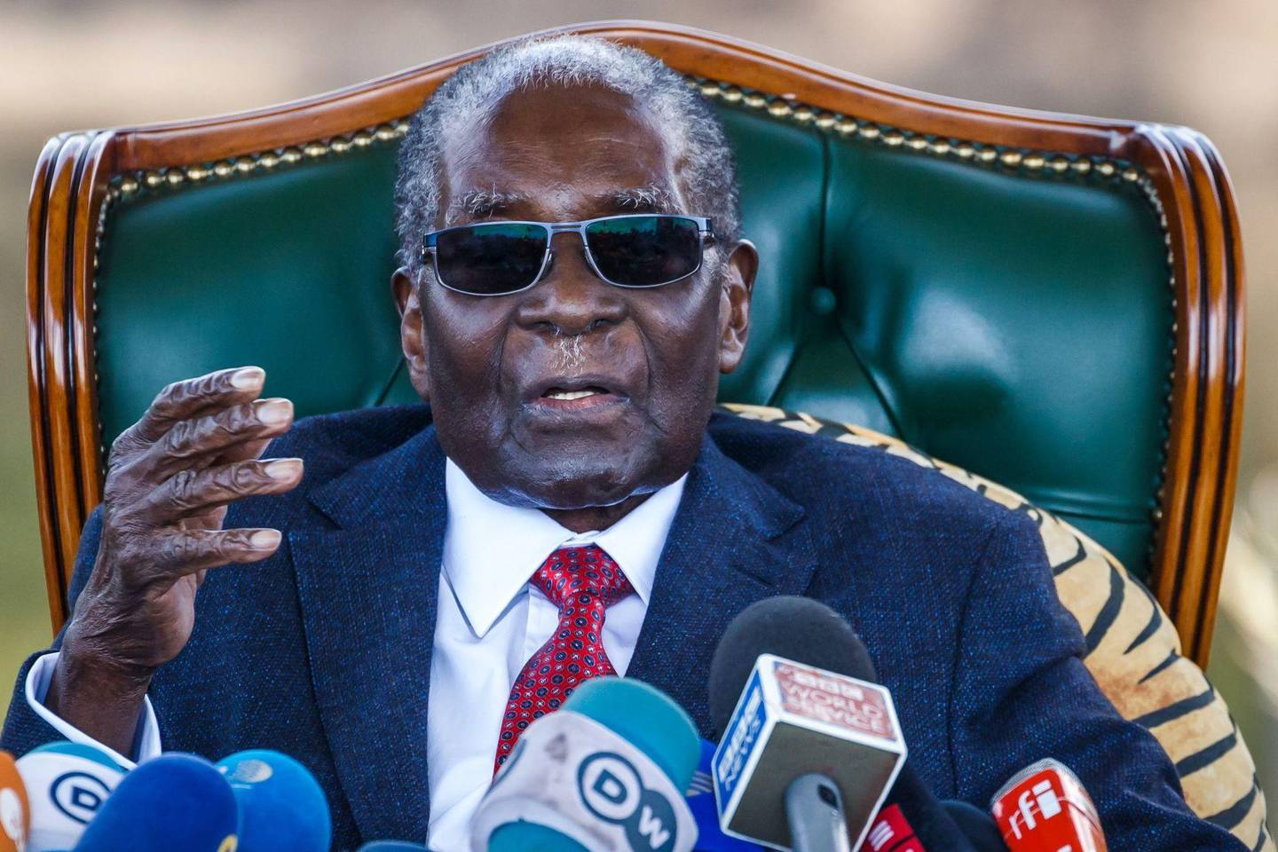 (FILES) In this file photo taken on July 29, 2018 (FILES) Zimbabwe's then President Robert Mugabe delivers a speech during a graduation ceremony at the Zimbabwe Open University in Harare, where he presides as the Chancellor. - Zimbabwe ex-president Robert Mugabe has died aged 95 according to official on September 6, 2019. (Photo by Jekesai NJIKIZANA / AFP)