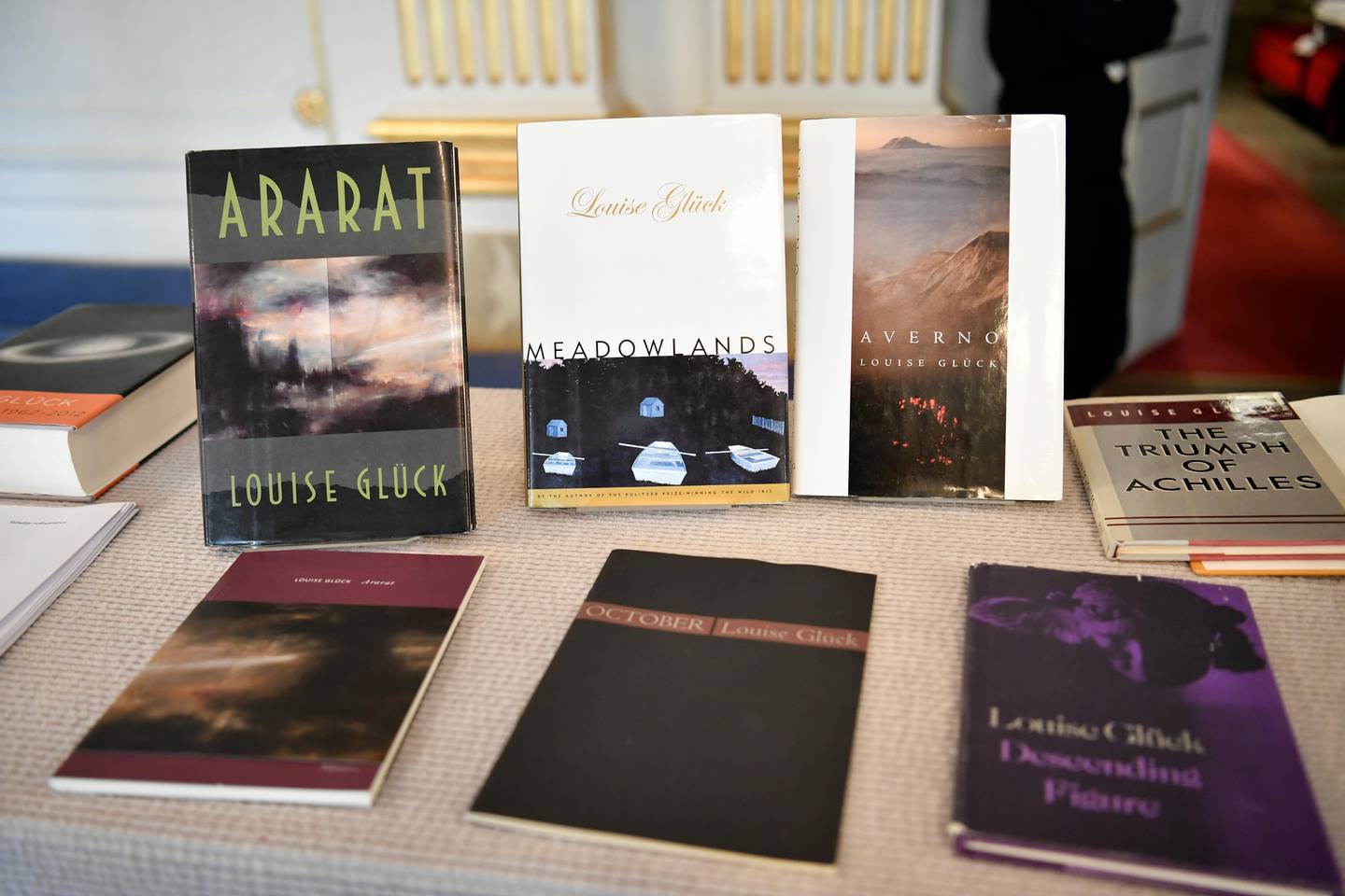 Books of American poet Louise Gluck during the announcement of 2020 Nobel Prize in literature at Borshuset in Stockholm, October 8, 2020. Gluck won the prize. TT News Agency/Henrik Montgomery/via REUTERS      ATTENTION EDITORS - THIS IMAGE WAS PROVIDED BY A THIRD PARTY. SWEDEN OUT.