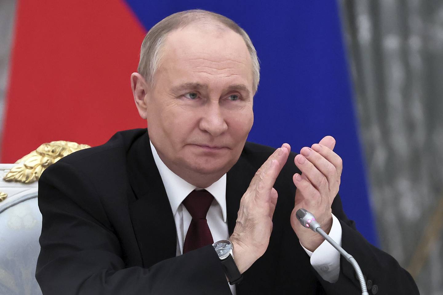 Russian President Vladimir Putin attends a meeting with railway industry veterans and workers to mark the 50th anniversary of the Baikal-Amur Mainline (BAM) construction at the Kremlin in Moscow, Russia, Monday, April 22, 2024. (Sofia Sandurskaya, Sputnik, Kremlin Pool Photo via AP)