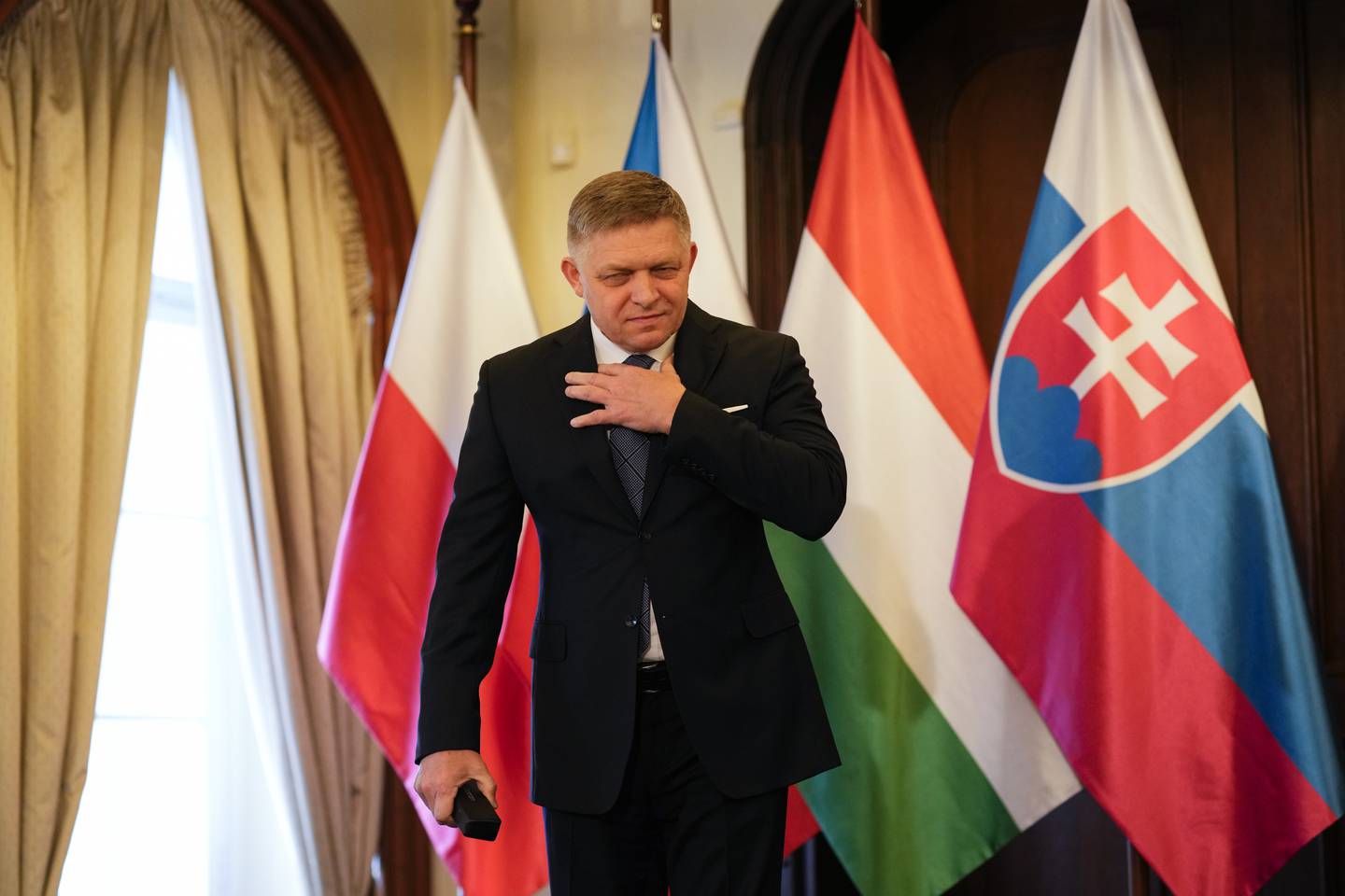 Slovakia's Prime Minister Robert Fico arrives for the V4 meeting in Prague, Czech Republic, Tuesday, Feb. 27, 2024. (AP Photo/Petr David Josek)