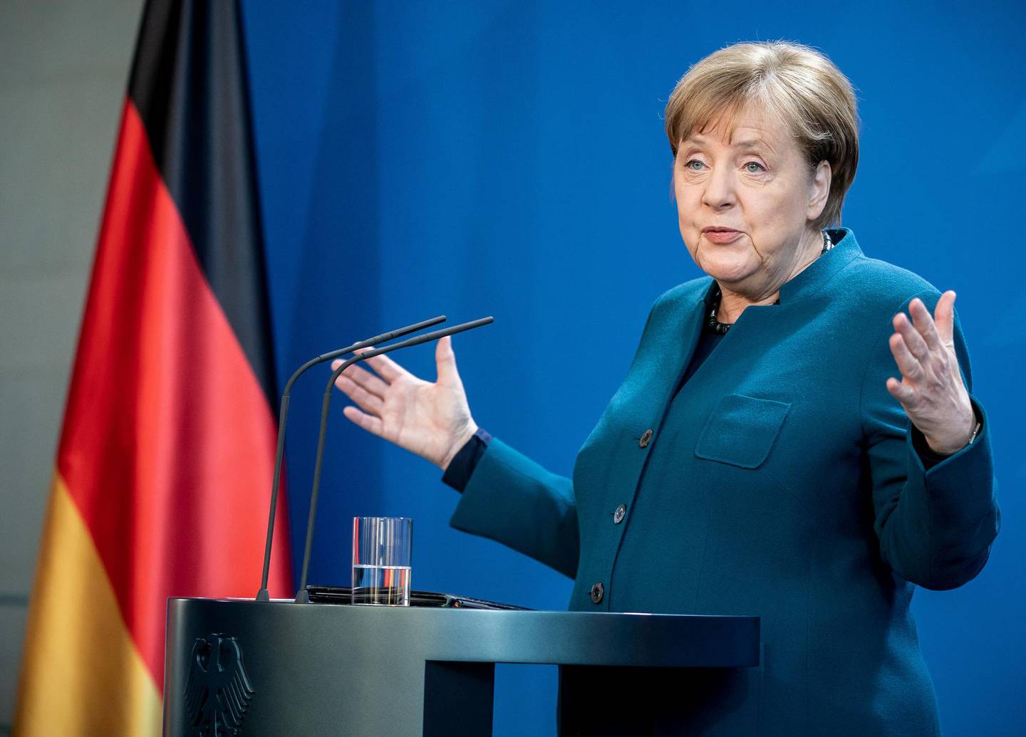 FILE PHOTO: German Chancellor Angela Merkel gives a media statement on the spread of the new coronavirus disease (COVID-19) at the Chancellery in Berlin, Germany, March 22, 2020.   Michel Kappeler/Pool via REUTERS/File Photo