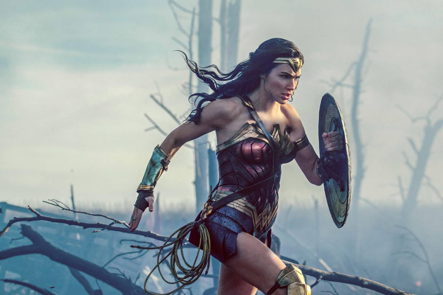This image released by Warner Bros. Entertainment shows Gal Gadot in a scene from "Wonder Woman." A new study organized by TimeÄôs Up, the Hollywood-based organization formed to promote gender equality, finds that female-led films outperform male-led movies at the box office. The study analyzed the 350 top-grossing films worldwide released between January 2014 and December 2017. It found that in films with small, medium and large budgets, all averaged better global grosses when a woman was listed as the lead star. (Clay Enos/Warner Bros. Entertainment via AP)