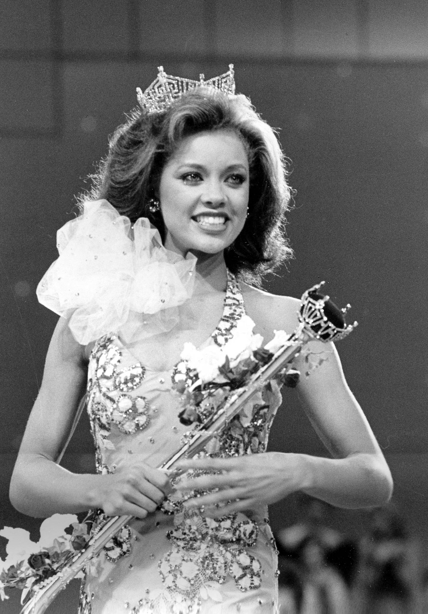FILE - In this Sept. 17, 1983 file photo, Miss New York Vanessa Williams appears during her coronation walk after she was crowned Miss America 1984 at the Miss America Pageant in Atlantic City, N.J. The Miss America Organization, Dick Clark Productions and the ABC television network announced Tuesday, Sept. 8, 2015, that they are bringing back the actress and singer to serve as head judge for the 2016 competition. Williams won the title in 1984 but resigned after Penthouse magazine published sexually explicit photographs of her taken several years earlier.   (AP Photo/Jack Kanthal, File)