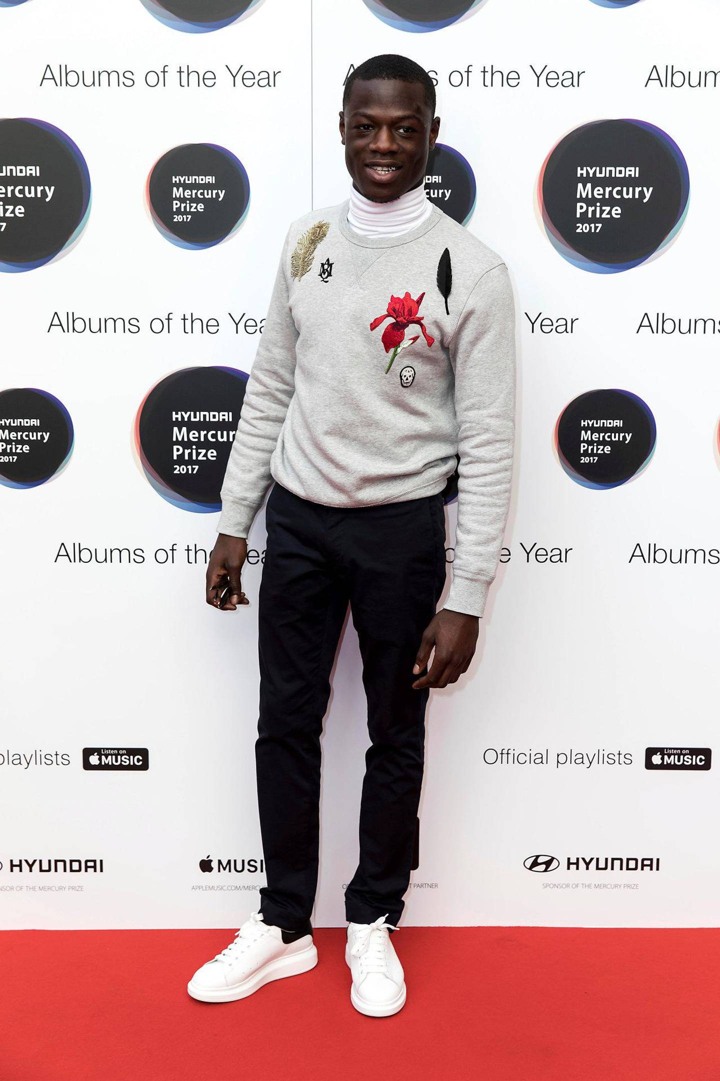 J Hus da han ble nominert til Mercury-prisen i Storbritannia i 2017. Han topper testlisten til Official Charts Company med «Must Be». Søndag har verdens første offisielle afrobeat-toppliste premiere. Foto: AP