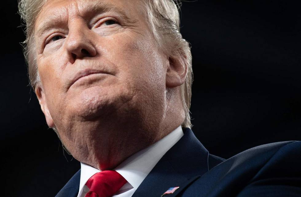 (FILES) In this file photo taken on January 9, 2020 US President Donald Trump speaks during a "Keep America Great" campaign rally at Huntington Center in Toledo, Ohio. - The head of a Canadian food giant appeared to blame US President Donald Trump for the deaths of Canadians, including an employee's wife and child, in the downing of a jetliner in Iran. The Ukraine International Airlines Boeing 737 was shot down by a missile shortly after taking off from Tehran before dawn last January 8, 2020, killing all 176 passengers and crew on board. Fifty-seven of the victims were Canadian. Maple Leaf Foods chief executive Michael McCain said late January 12, 2020 in a Twitter message that a colleague lost his wife and child to a "needless, irresponsible series of events in Iran." (Photo by SAUL LOEB / AFP)