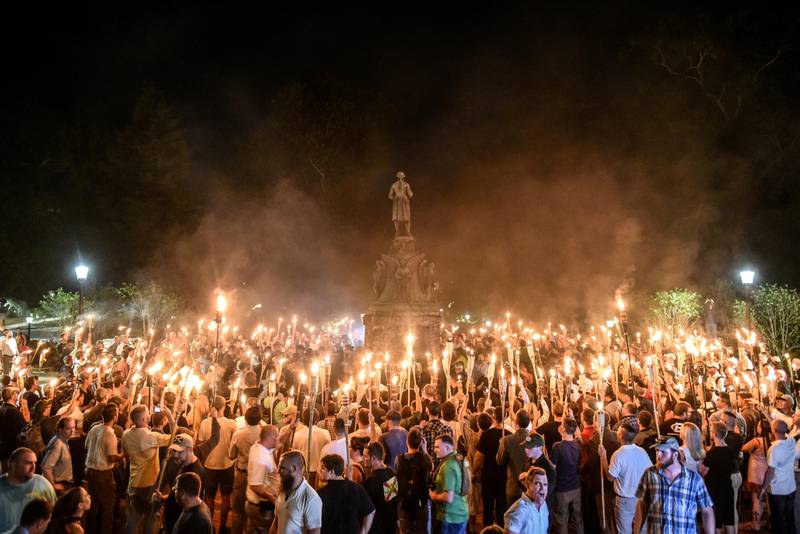 White nationalists participate in a torch-lit march on the grounds of the University of Virginia ahead of the Unite the Right Rally in Charlottesville, Virginia on August 11, 2017. Picture taken August 11, 2017.  REUTERS/Stephanie Keith      TPX IMAGES OF THE DAY