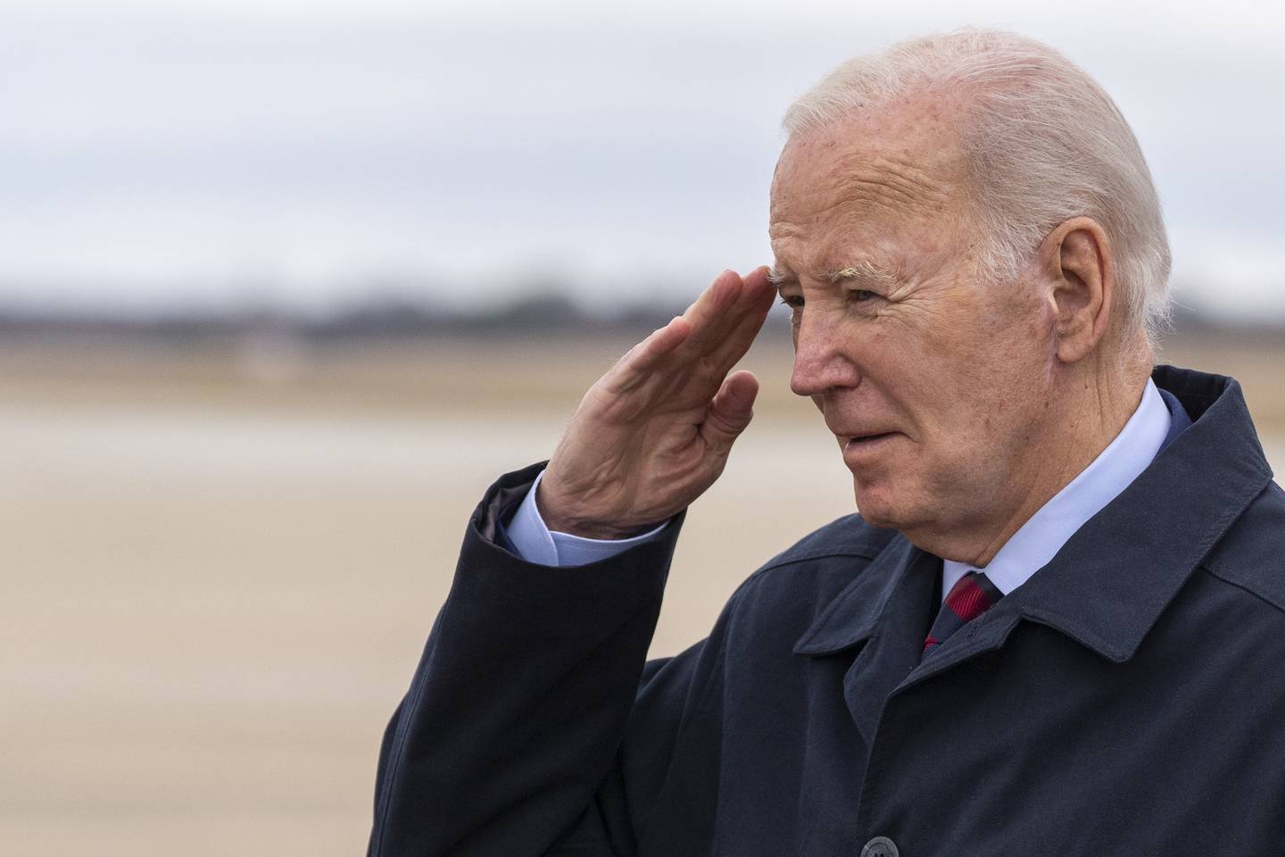 President Joe Biden salutes as he steps off Air Force One upon arrival, Tuesday, March 5, 2024, at Andrews Air Force Base, Md. Biden is returning from a trip to Camp David. (AP Photo/Alex Brandon)