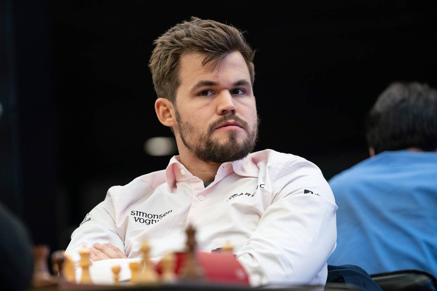 Magnus Carlsen, Norwegian chess grandmaster and the current World Chess Champion attends the Open World Rapid and Blitz Championships in Moscow, Russia, Saturday, Dec. 28, 2019. (AP Photo/Maria Emelianova)
