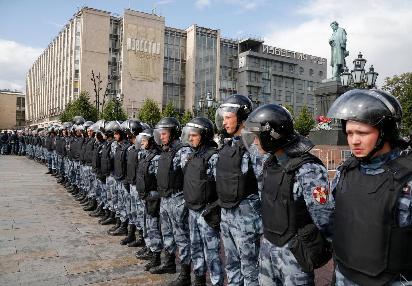 Police block a square during an unsanctioned rally in the center of Moscow, Russia, Saturday, Aug. 3, 2019. Moscow police on Saturday detained nearly 90 people protesting the exclusion of some independent and opposition candidates from the city council ballot, a monitoring group said, a week after arresting nearly 1,400 at a similar protest. (AP Photo/ Alexander Zemlianichenko)
