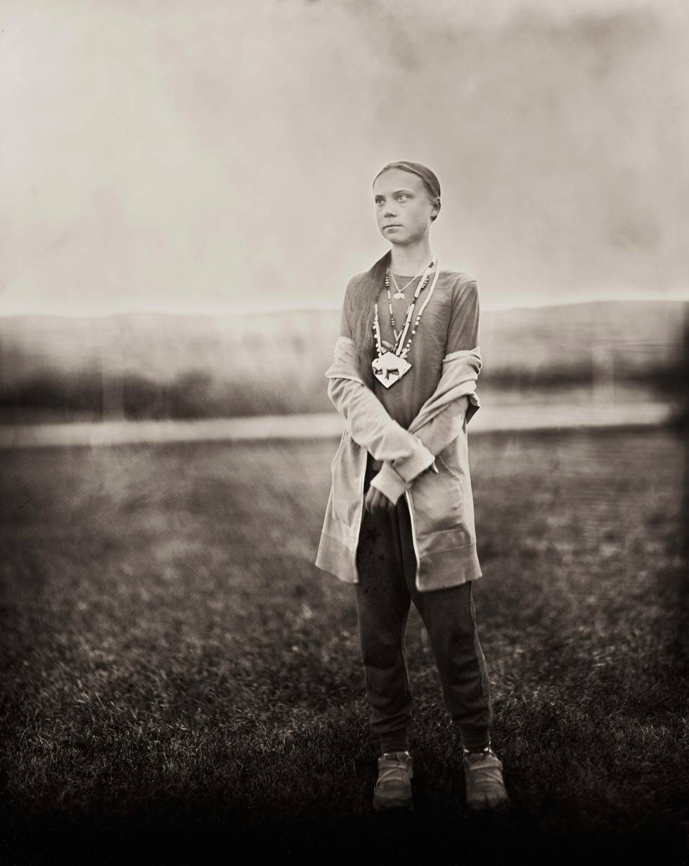 This Oct. 8, 2019 photo provided by Shane Balkowitsch shows climate activist Greta Thunberg visiting the Standing Rock Sioux Reservation in Fort Yates, N.D. Thunberg accepted the photographer's request to pose for the photo using an old technique that involves wetting glass plates with various chemicals before making an exposure. The resulting photographs are being archived at the Library of Congress in Washington and the Swedish History Museum in Stockholm. (Shane Balkowitsch via AP)