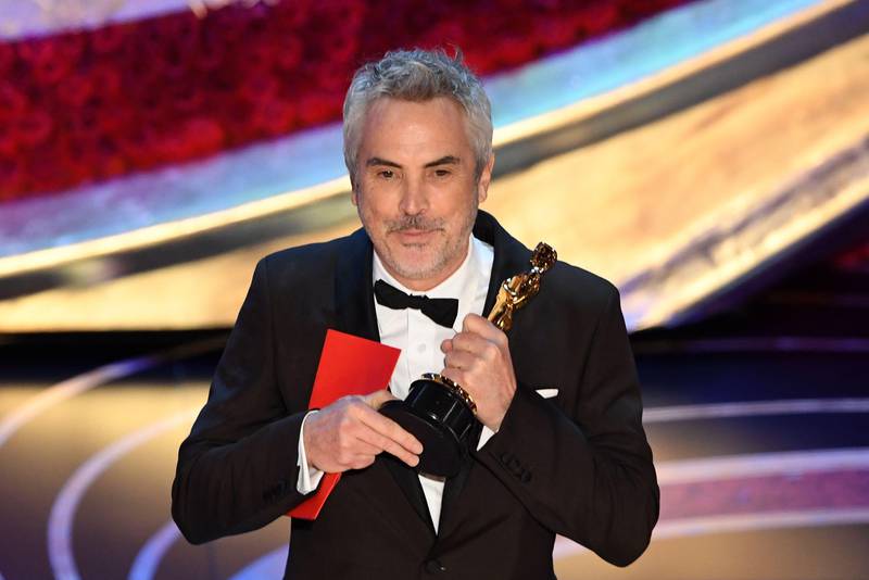 Best Foreign Language Film nominee for "Roma" Mexican director Alfonso Cuaron accepts the award for Best Foreign Language Film during the 91st Annual Academy Awards at the Dolby Theatre in Hollywood, California on February 24, 2019. (Photo by VALERIE MACON / AFP)