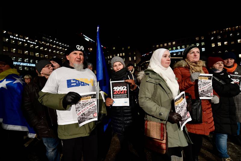 Demonstrators protest the awarding of the 2019 Nobel literature prize to Peter Handke during a demonstration in Stockholm, Tuesday, Dec. 10, 2019. (Stina Stjernkvist/TT News Agency via AP)