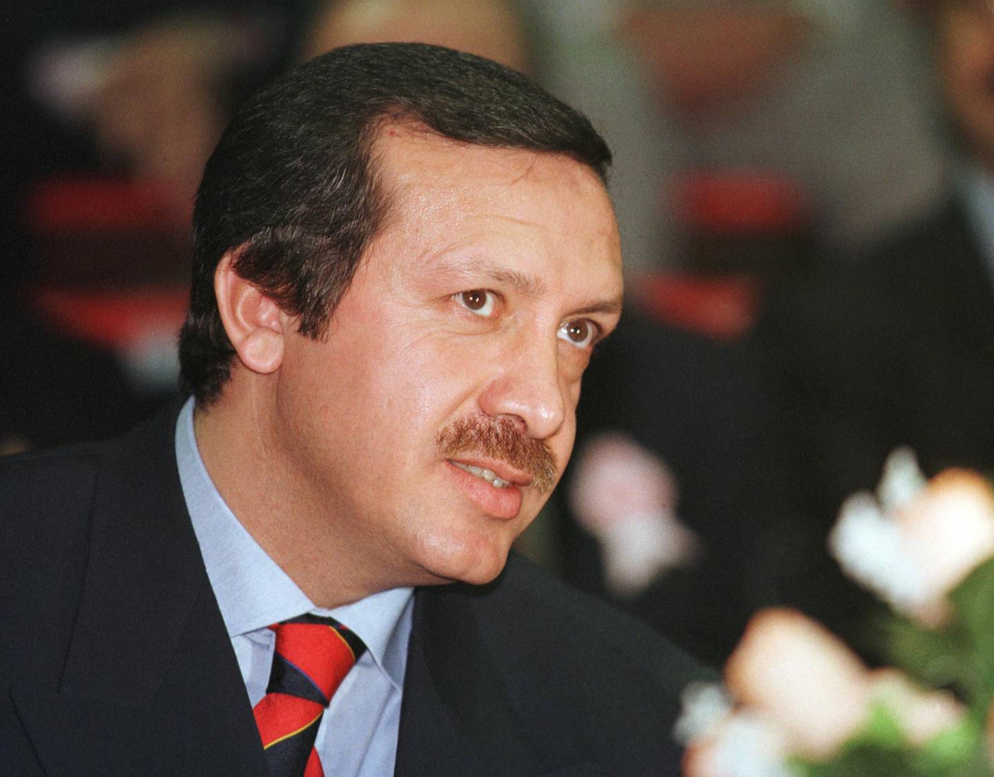 FILE - Istanbul Mayor Recep Tayyip Erdogan during the outlawed Islamic Welfare Party's provincial congress in Istanbul, Sunday, December 21, 1997. In a blow to the Islamic movement, a court in southeastern Diyarbakir city sentenced Erdogan, seen as the Islamic movement's up and coming leader, to 10 months in prison for inciting hatred based on religious differences.(AP Photo/Murad Sezer/File)