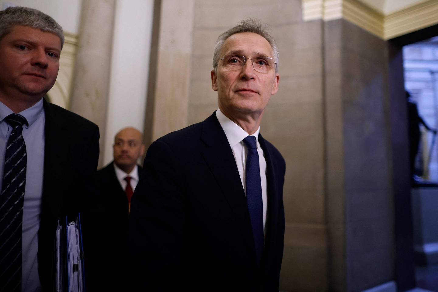 WASHINGTON, DC - JANUARY 30: NATO Secretary General Jens Stoltenberg (C) leaves the offices of Speaker of the House Mike Johnson (R-LA) following meetings at the U.S. Capitol on January 30, 2024 in Washington, DC. Stoltenberg is in Washington to meet with Biden Administration officials and Congressional leaders to encourage lawmakers to approve a $61 billion aid package for Ukraine.   Chip Somodevilla/Getty Images/AFP (Photo by CHIP SOMODEVILLA / GETTY IMAGES NORTH AMERICA / Getty Images via AFP)