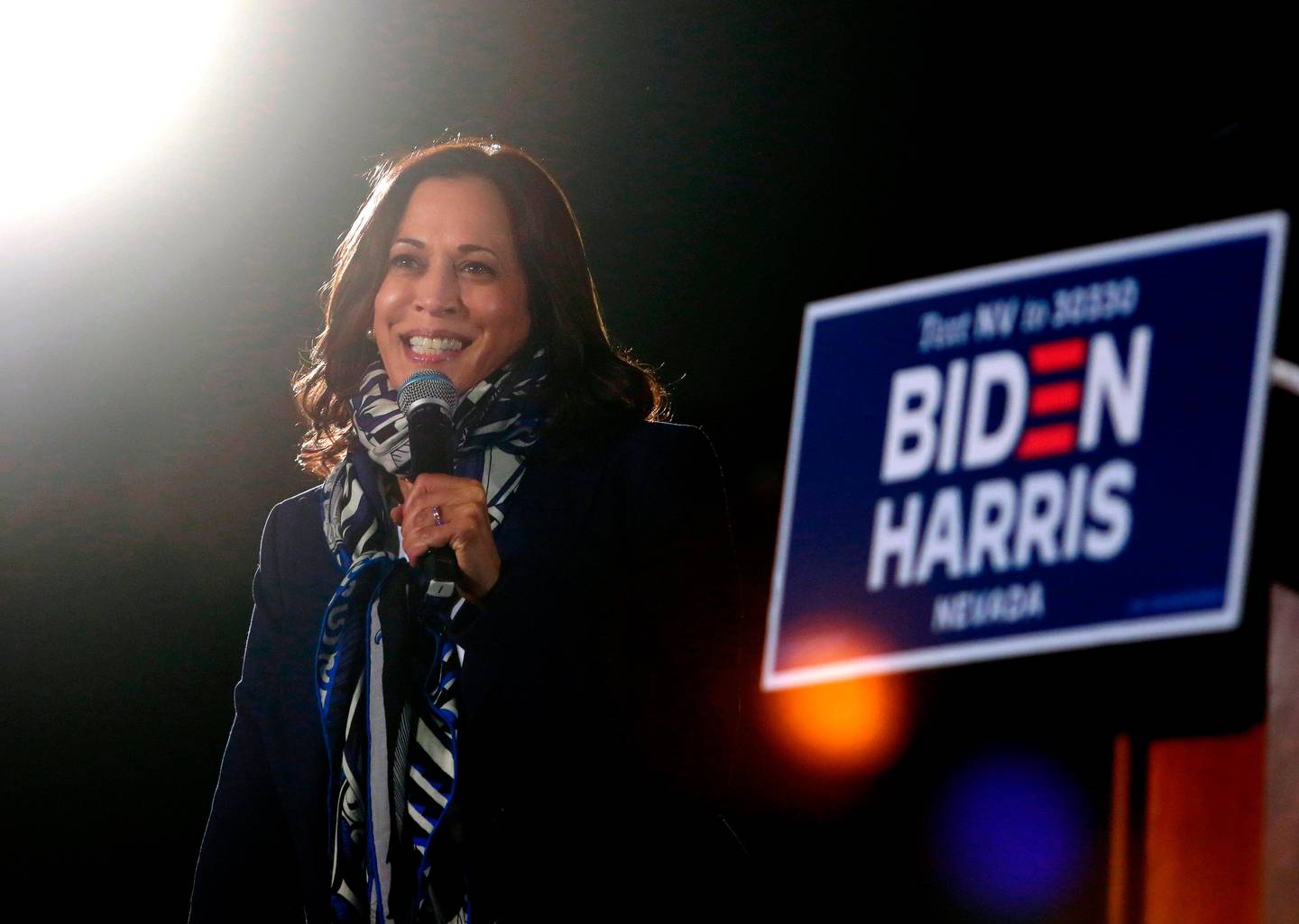 Senator from California and Democratic vice presidential nominee Kamala Harris speak during a voter mobilization event on October 27, 2020, in Las Vegas. (Photo by Ronda Churchill / AFP)