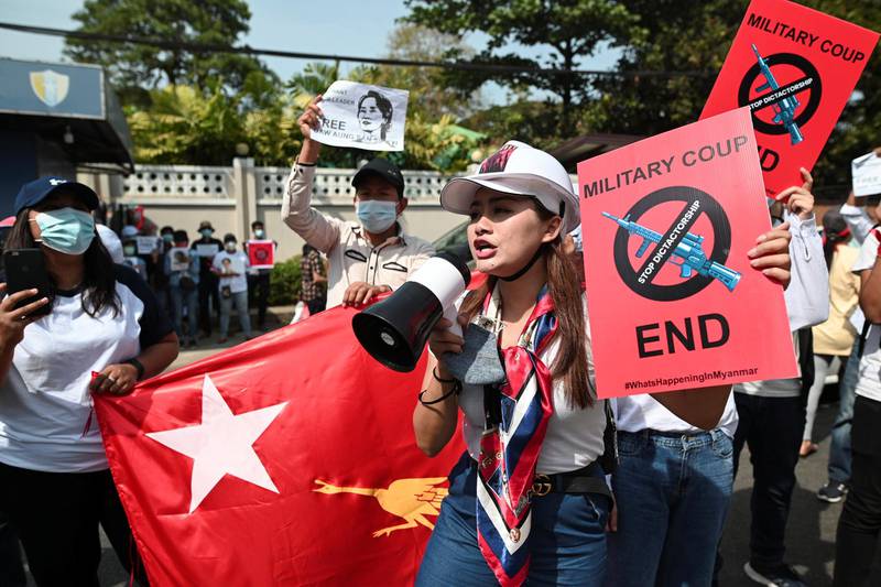 Demonstrators protest in front of Russian embassy against the military coup and demand for the release of elected leader Aung San Suu Kyi, in Yangon, Myanmar, February 12, 2021. REUTERS/Stringer