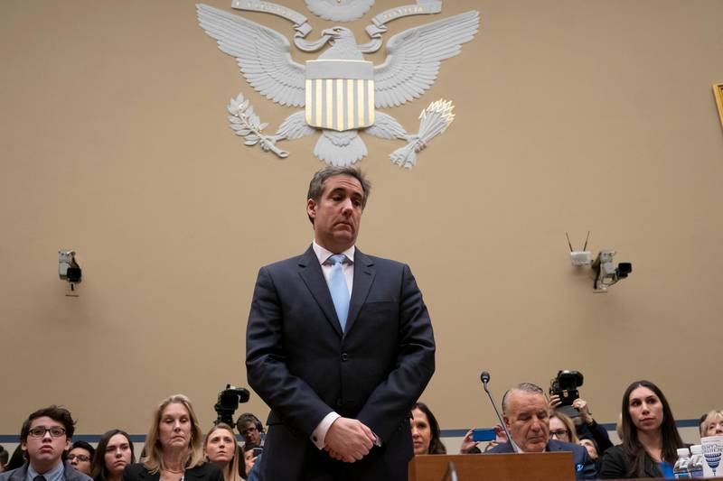 Michael Cohen, President Donald Trump's former personal lawyer, pauses just after being sworn in to testify before the House Oversight and Reform Committee on Capitol Hill in Washington, Wednesday, Feb. 27, 2019. (AP Photo/J. Scott Applewhite)